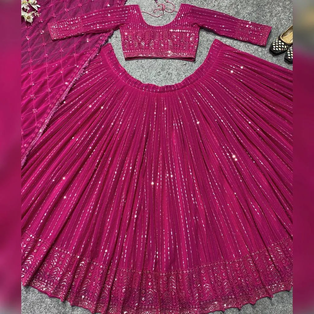 Beautiful Rani Pink Colored Multi Needle Work And Embroidery And Zari Work Lehenga Cholis For Women