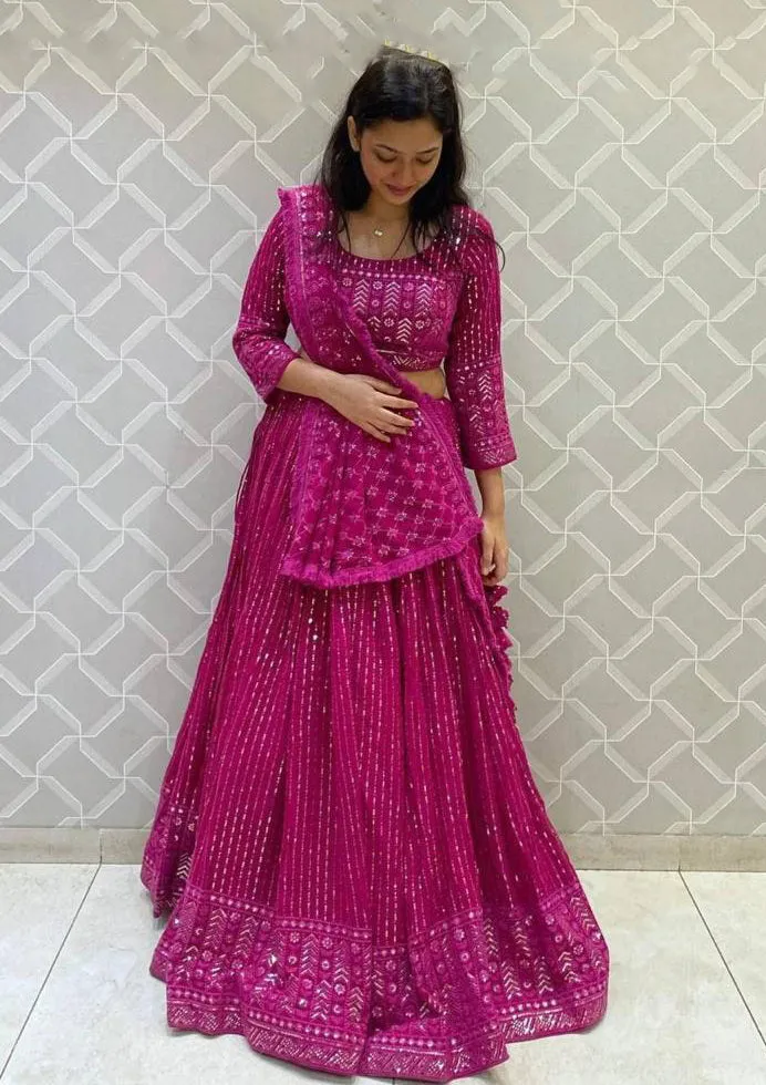 Beautiful Rani Pink Colored Multi Needle Work And Embroidery And Zari Work Lehenga Cholis For Women